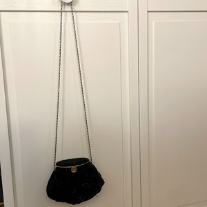 Black beaded vintage looking bag.